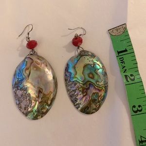 Large Abalone shell earrings with with fish hooks and red bead.